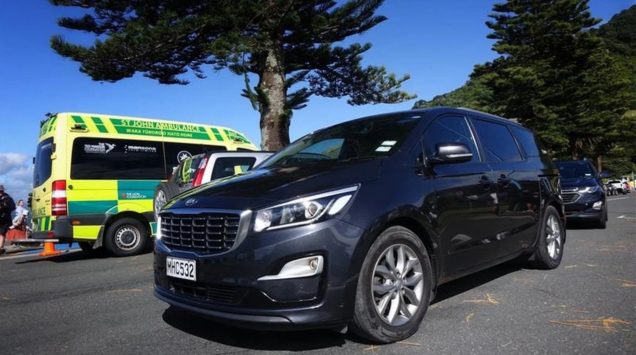 A hearse leaves the cordon around the campground at Mount Maunganui on Friday morning. Photo: RNZ