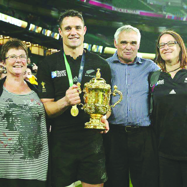 Dan Carter with his mum Bev, dad Neville and sister Sarah after the Rugby World Cup final in 2015...