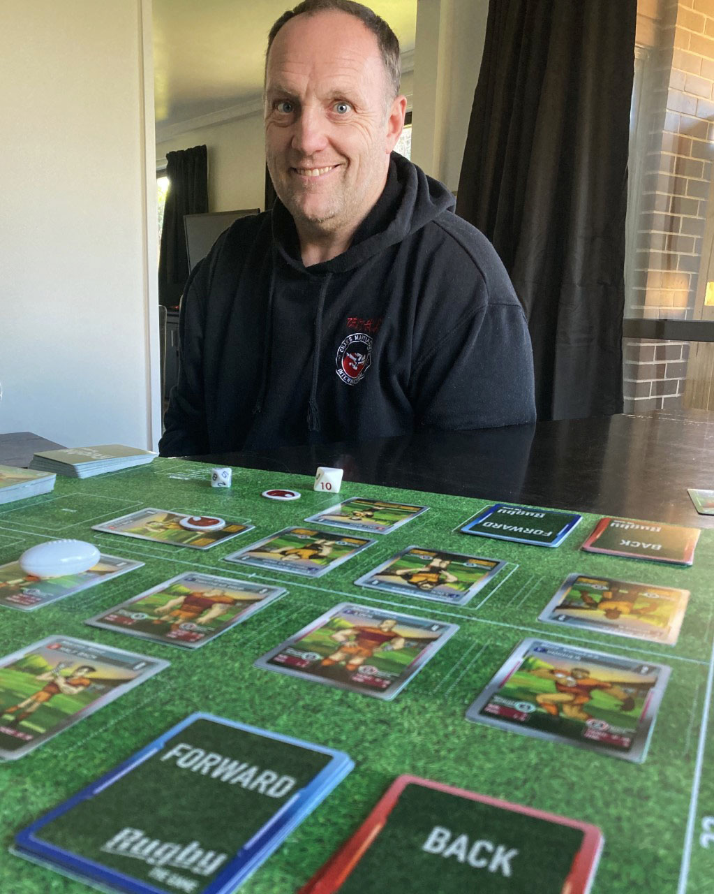 Zane Thompson has created a rugby board game. Photo: Chris Barclay