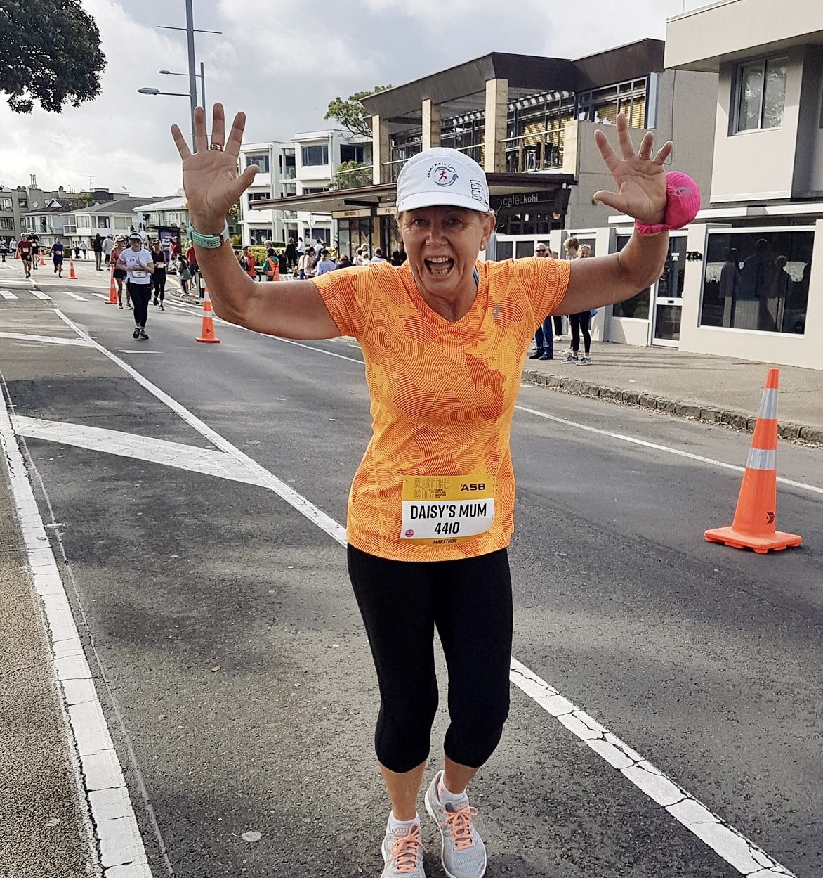 Dedicated distance runner Judy Brock on the verge of completing the Auckland marathon. Photo:...