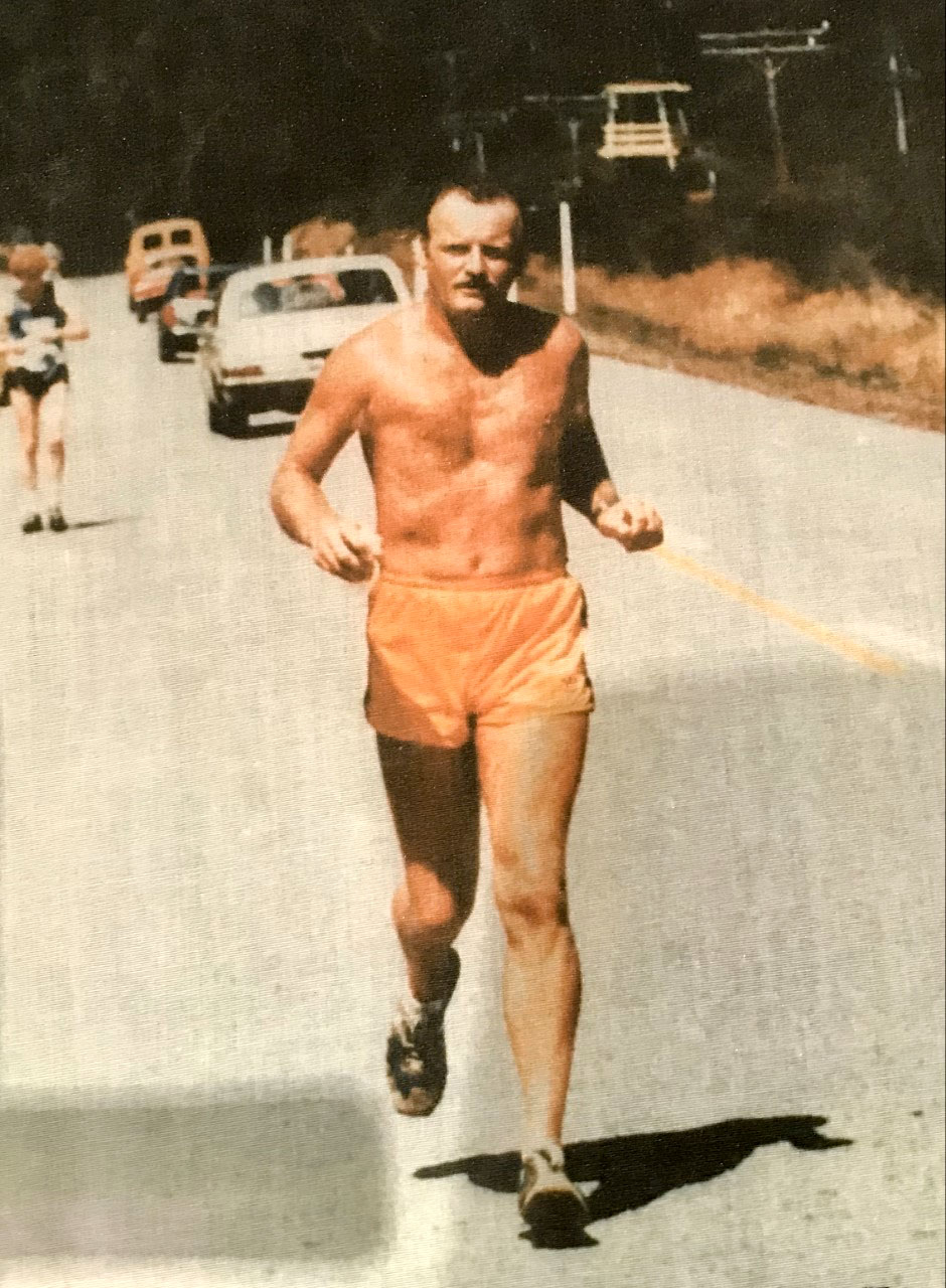 Judy Brock ran her 10th marathon with this photo of her father Bob Krom, who died in a helicopter...