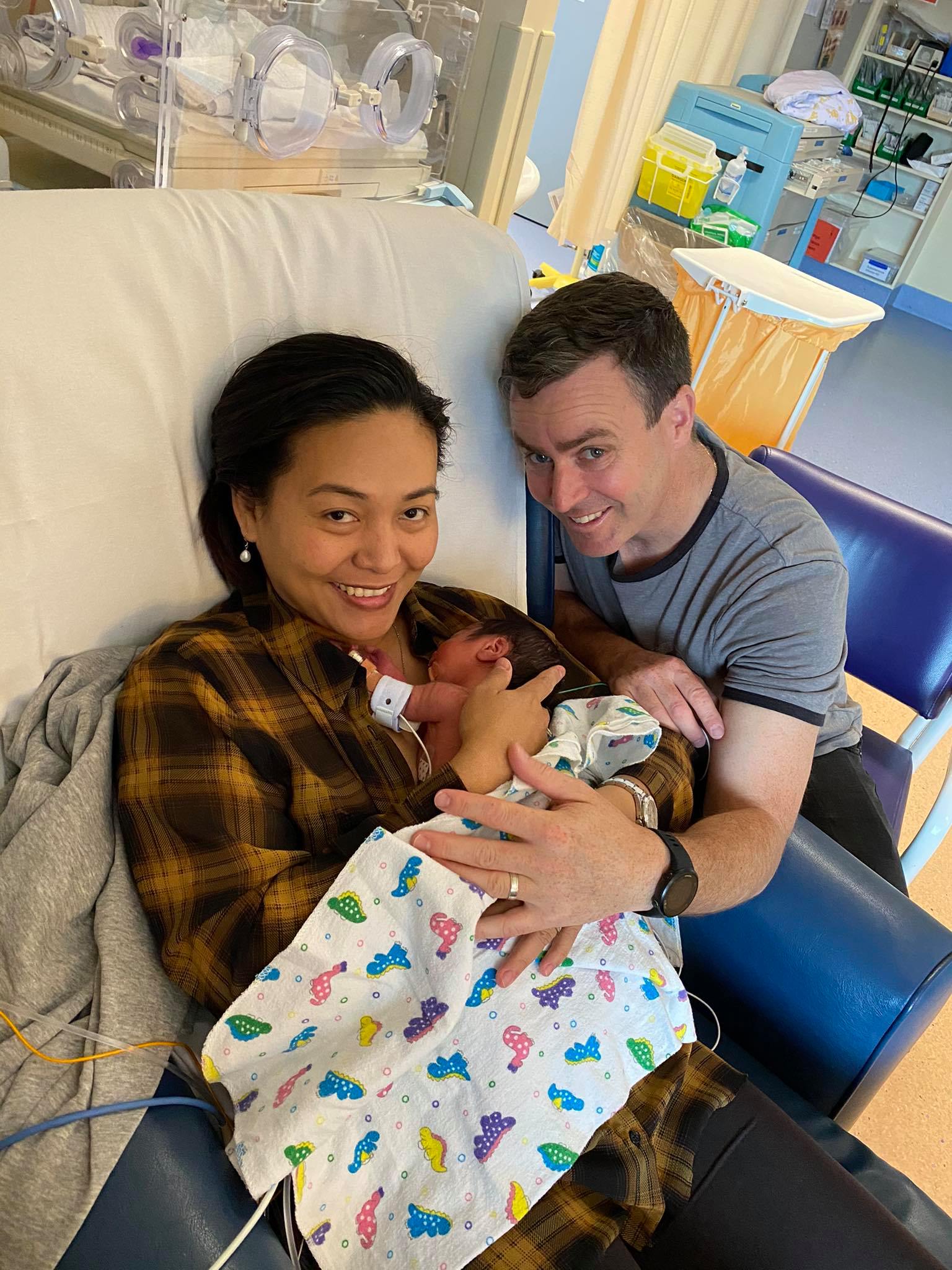 July and Dave McQueen with their son who was born eight weeks early. Photo: Supplied