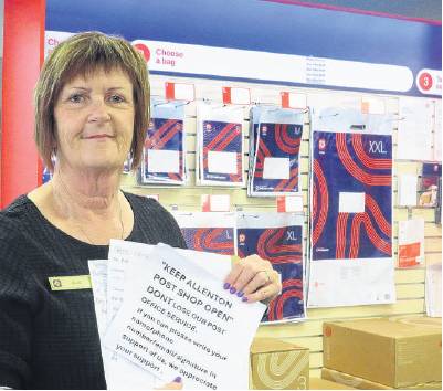 Gail Punselie with the petition to NZ Post. PHOTO: FILE