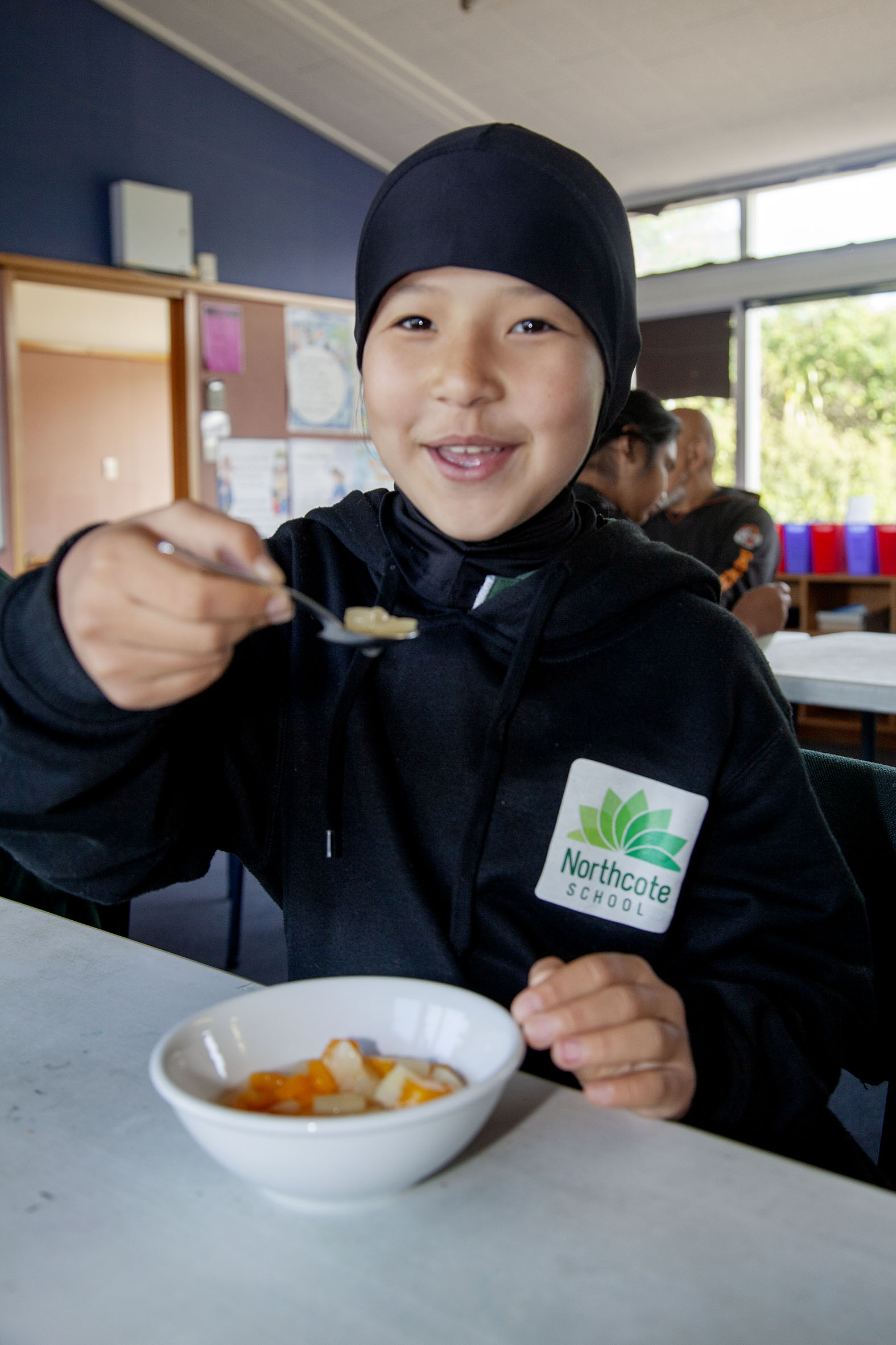 Year 6 pupil Zohreh Mehdizadeh tucks in. Photo: Geoff Sloan