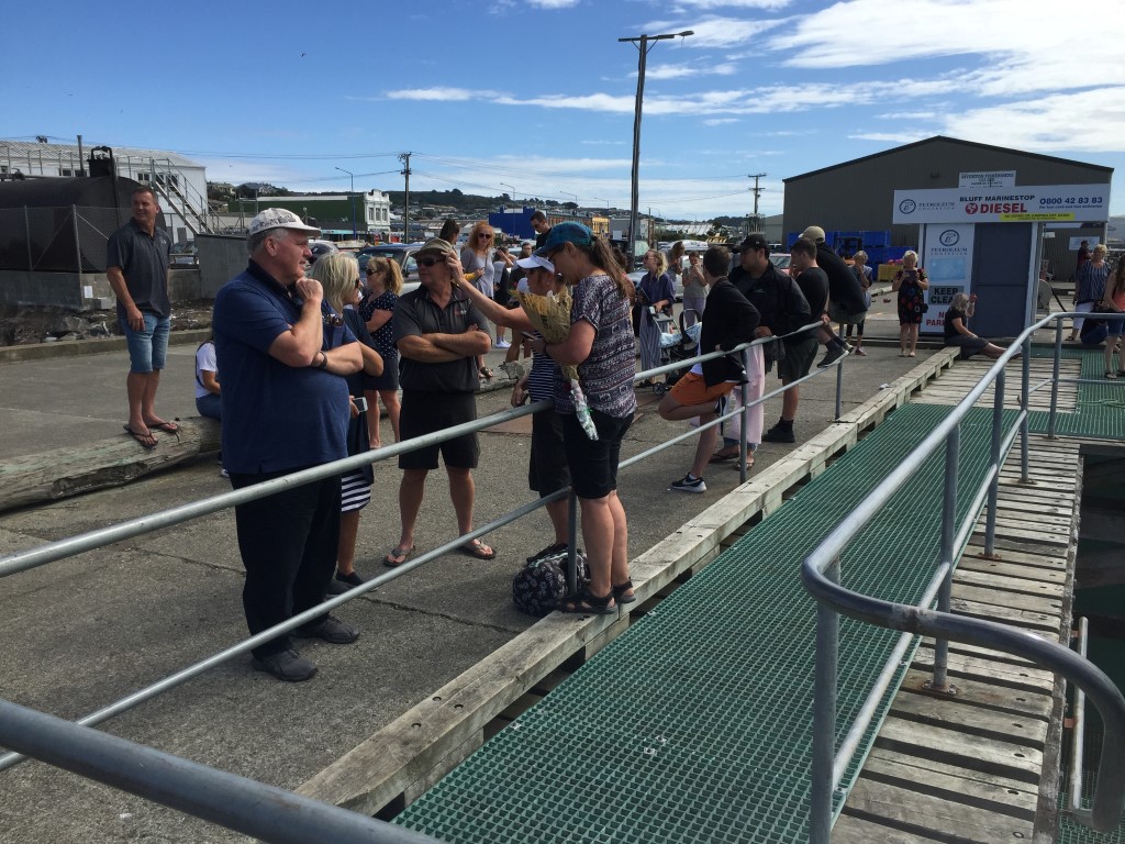 Supporters and family waiting for Hannah Morgan to arrive at the Bluff ferry terminal. Photo:...