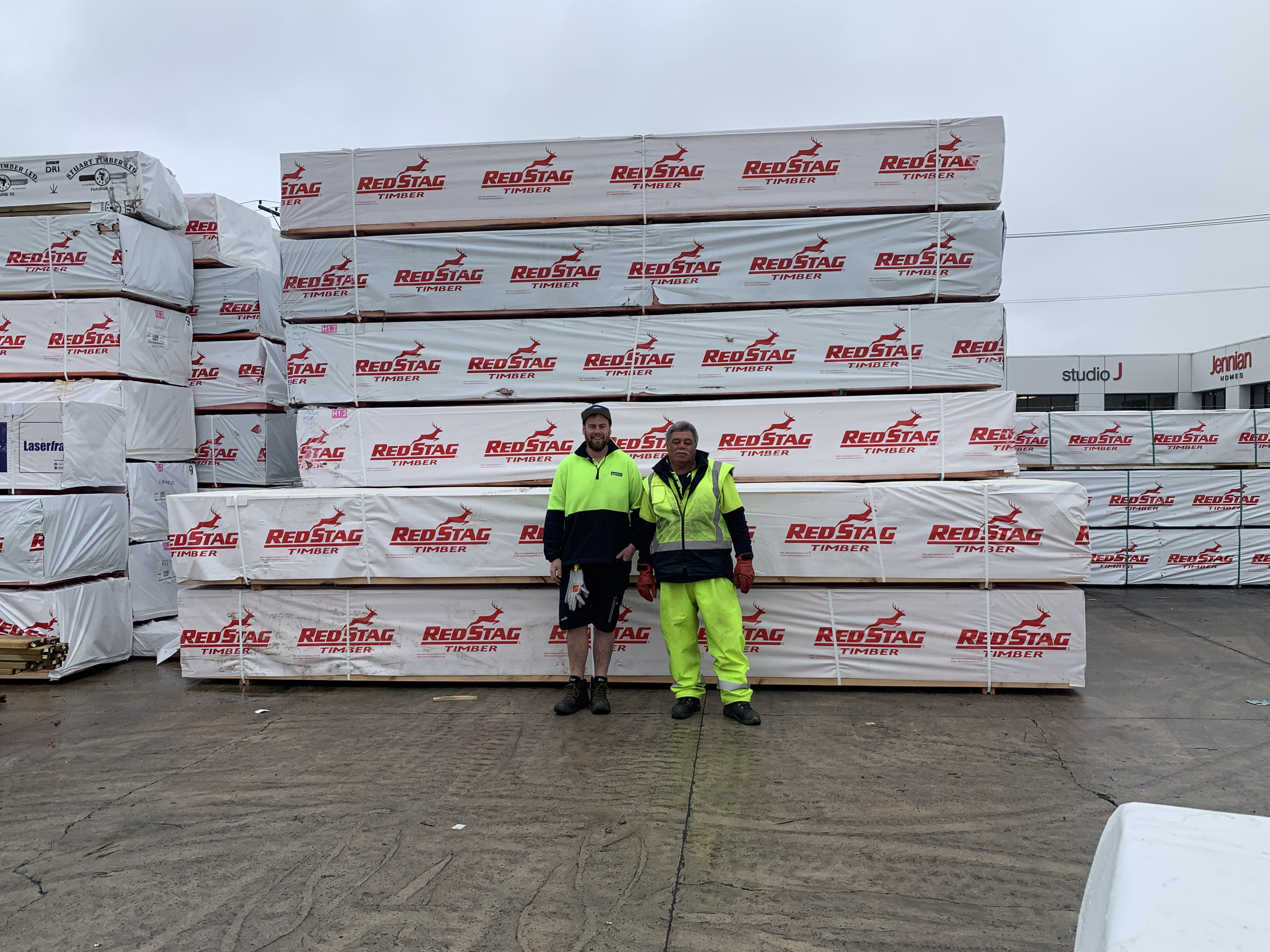 Timber yard team leader Tony Cockburn, with Mosie Purukamu.