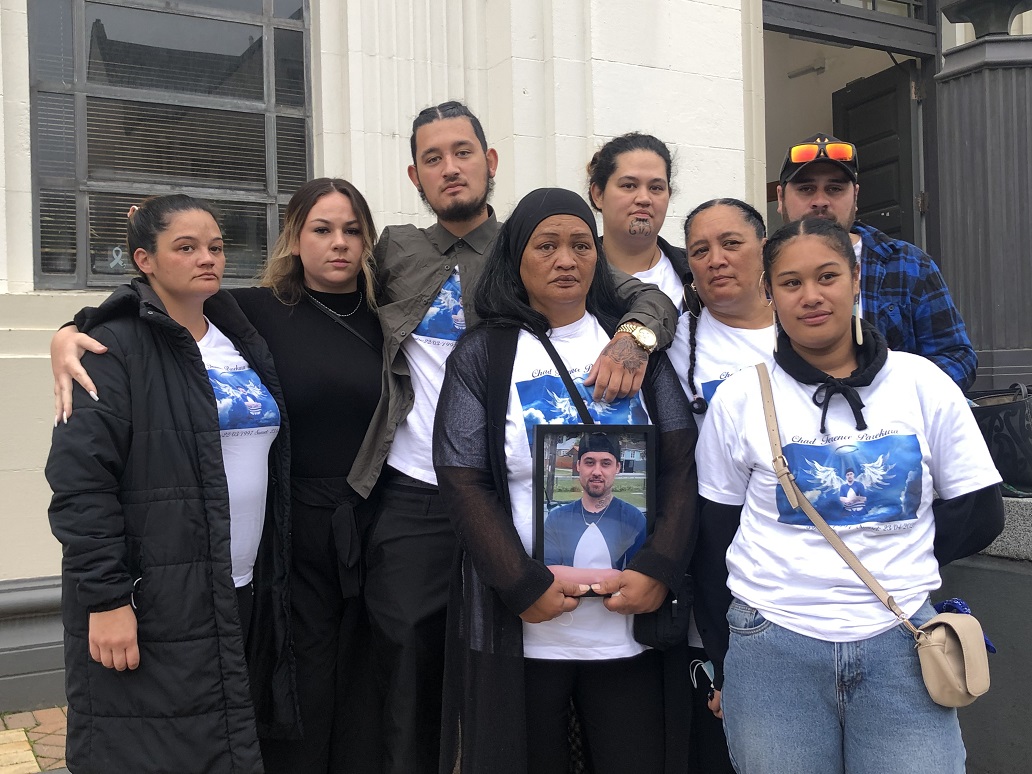 Family of Chad Parekura with a picture of the Lower Hutt man at a hearing about the case in...