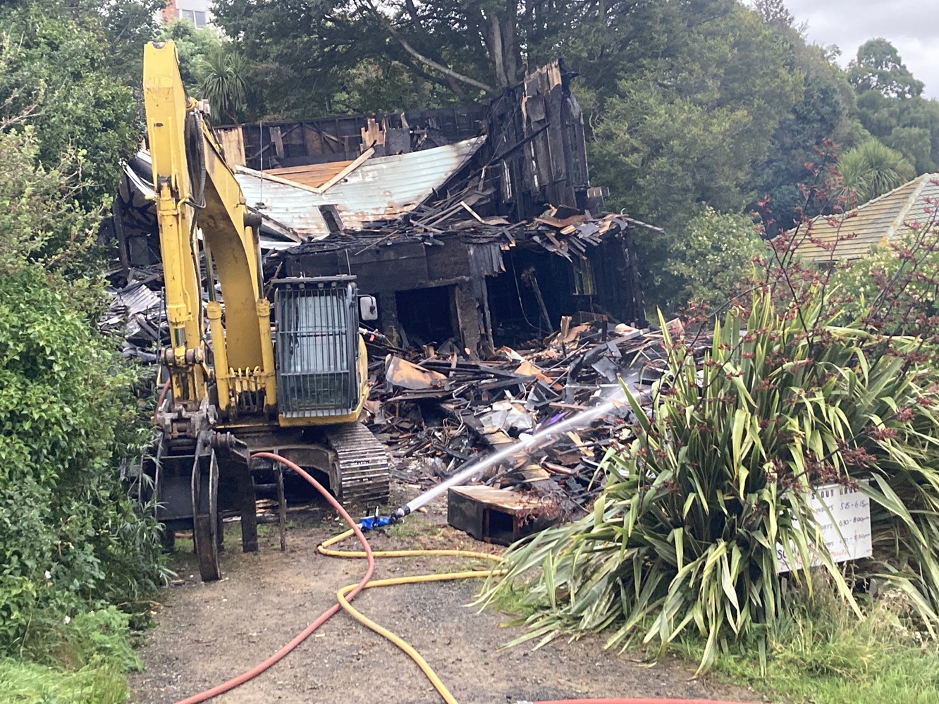 A digger at the scene on Thursday morning. Photo: Stephen Jaquiery