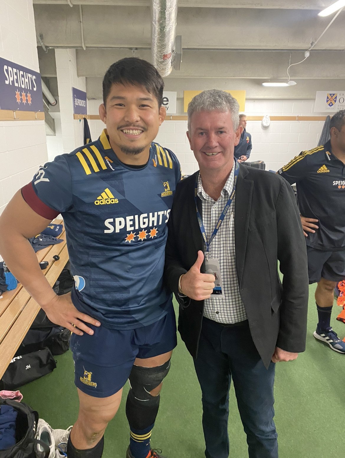 Outgoing Highlanders co-owner Shane Drummond with player Kazuki Himeno.