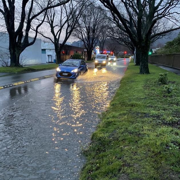 Flooding on Anzac Ave, Dunedin, this morning. Photo: Peter Mcintosh