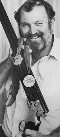 McCombe in 1990 with clay target shooting medals. Photo: Supplied