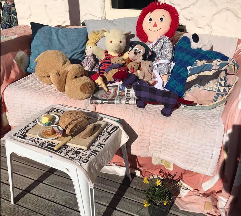 The toys gathered to eat home-made bread and read the Otago Daily Times. Photo: supplied 