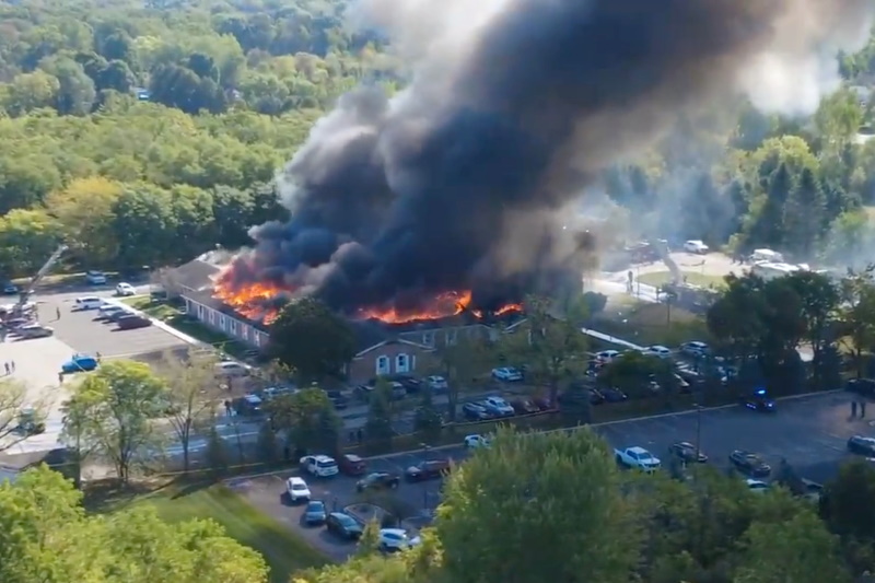 Massive flames and smoke rise from The Church of Jesus Christ of Latter-day Saints in Grand Blanc...