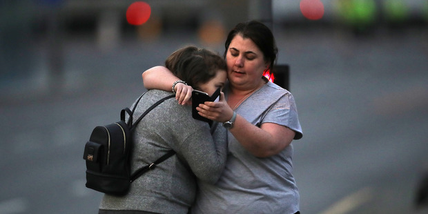 Ariana Grande concert attendees Vikki Baker and her daughter Charlotte, aged 13, leave the Park...