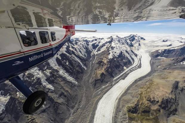 High above one of New Zealand's most famous glaciers - The Tasman. Since 1990 the ice has...