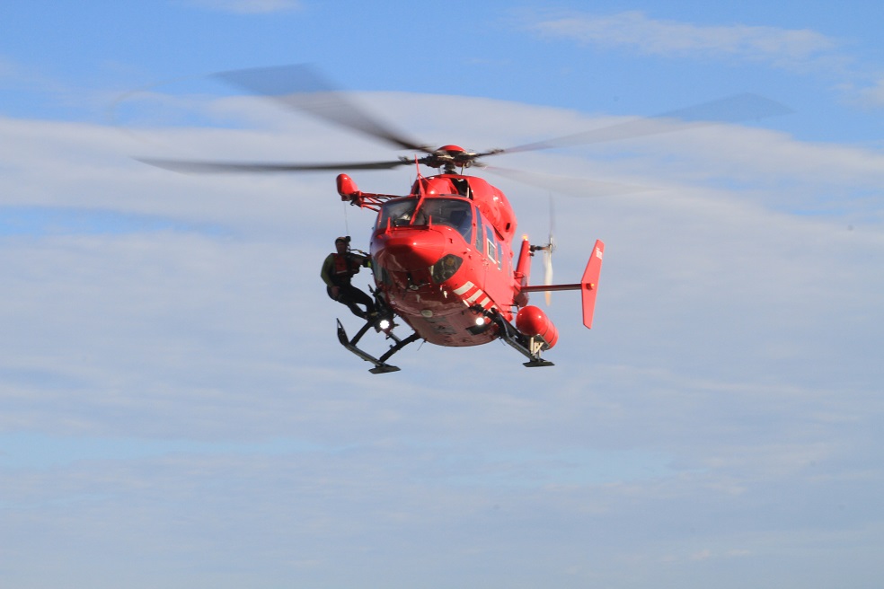 An Otago Rescue Helicopter crew member is hoisted back on board after leaving the water during...