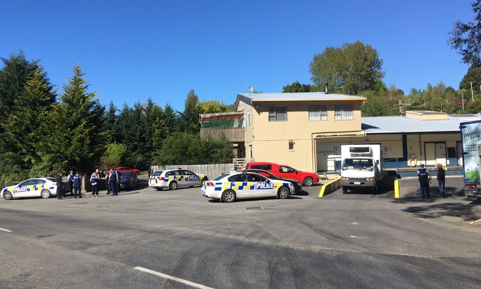 Armed offenders squad members were involved in a raid on an Oamaru address this morning. Photo:...