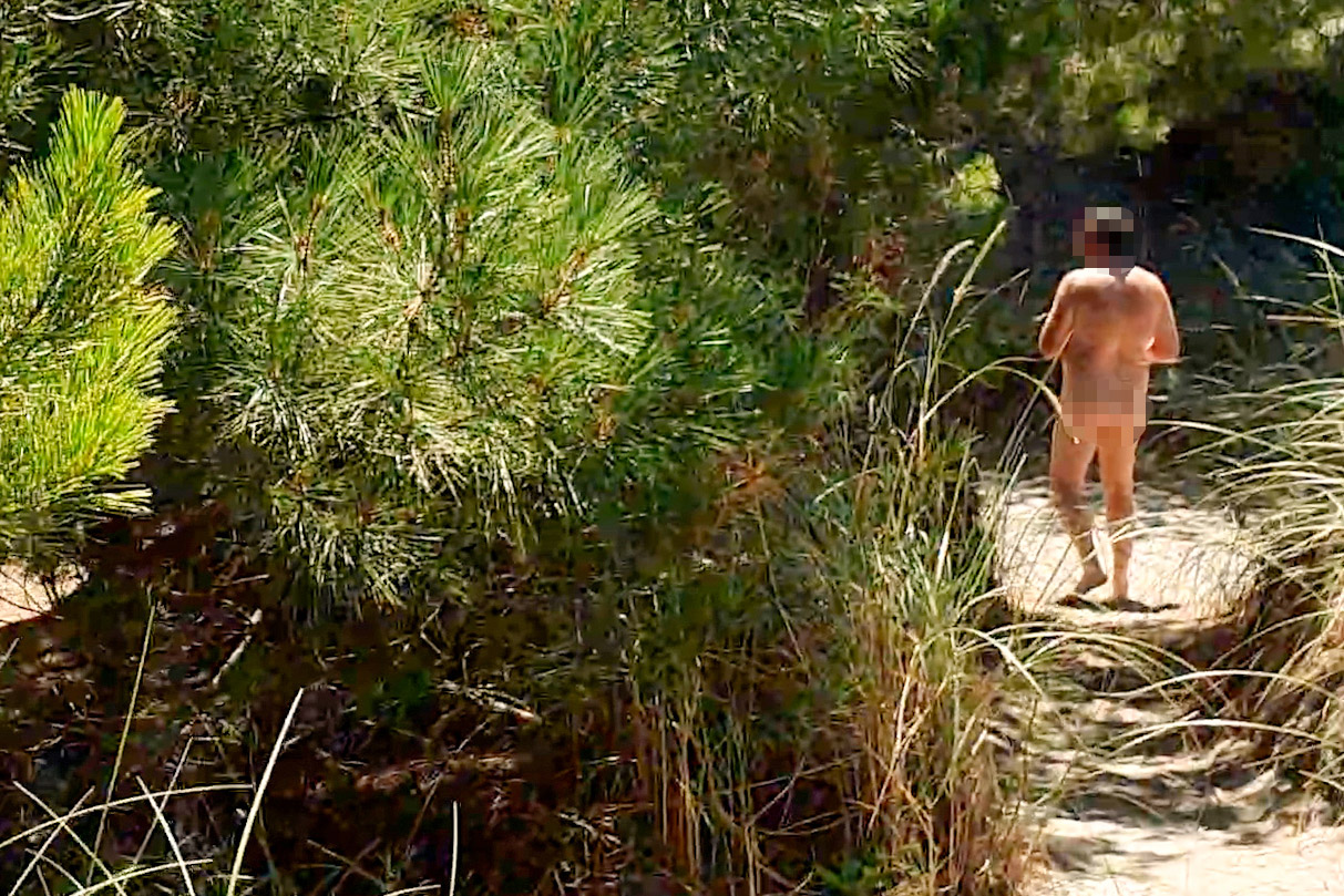 A naked man in the sand dunes at Spencer Park Beach. Photo: Supplied