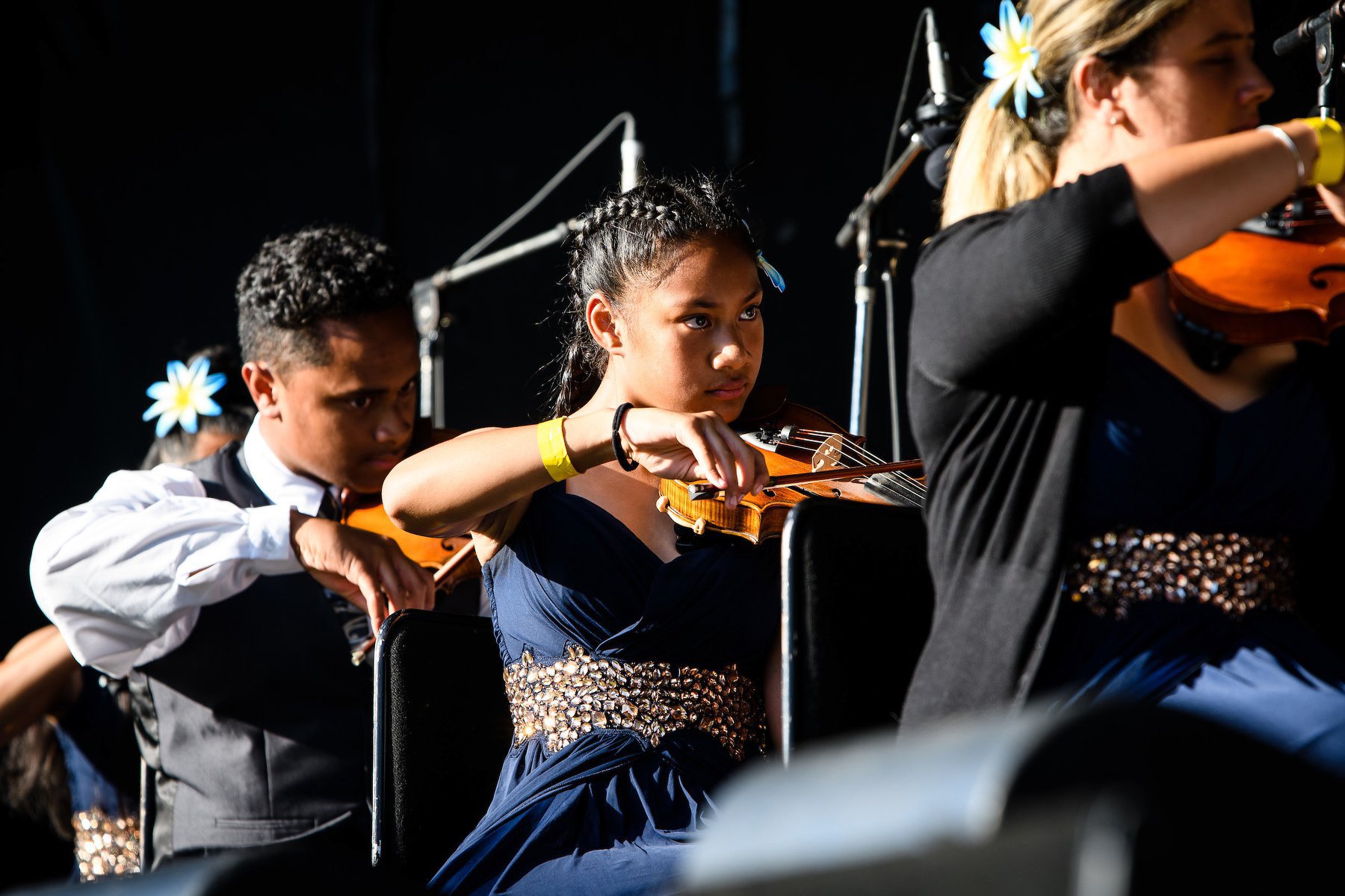 Members of the Virtuoso String Orchestra (from left) Toloa Faraimo, Rochelle Pese Akerise and...