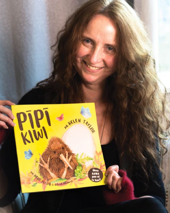 Helen Taylor with her children’s book, Pīpī Kiwi. Photo: Supplied