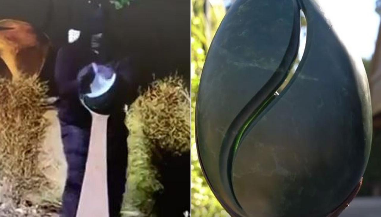 The water droplet-shaped piece was taken by a man dressed in black with his face obscured. Photo:...