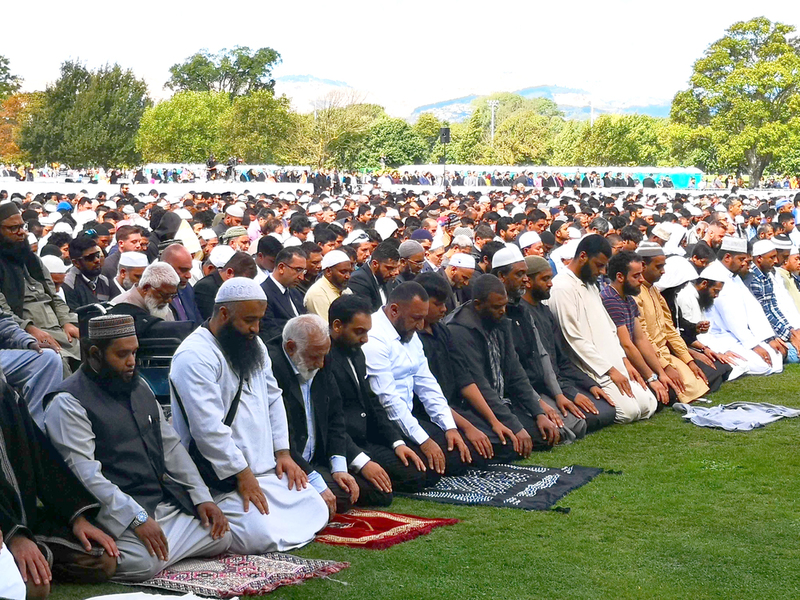 The mourners at Hagley Park in Christchurch during prayers on Friday. Photo: NZ Herald