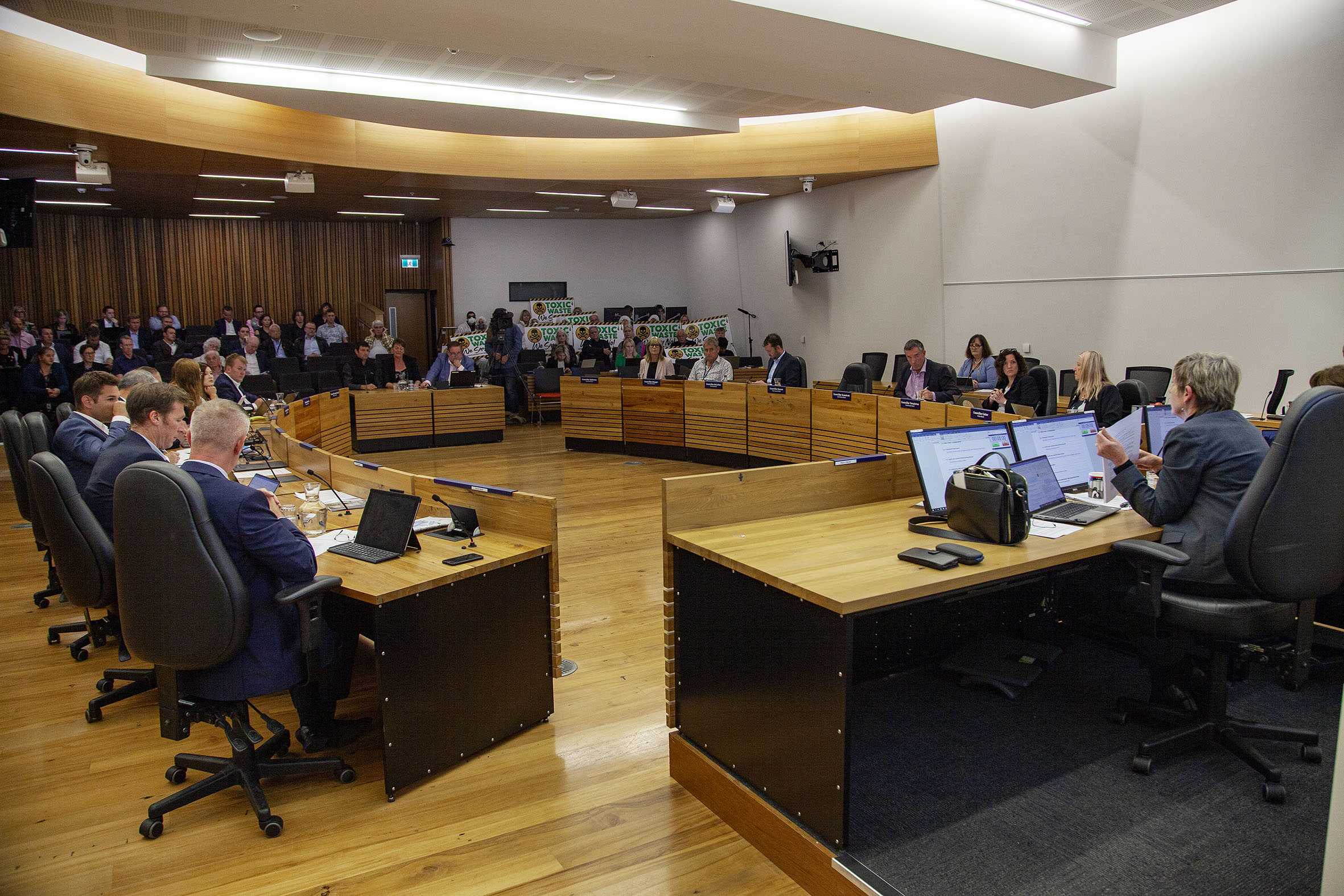 The protesters inside the city council chamber on Thursday. Photo Geoff Sloan