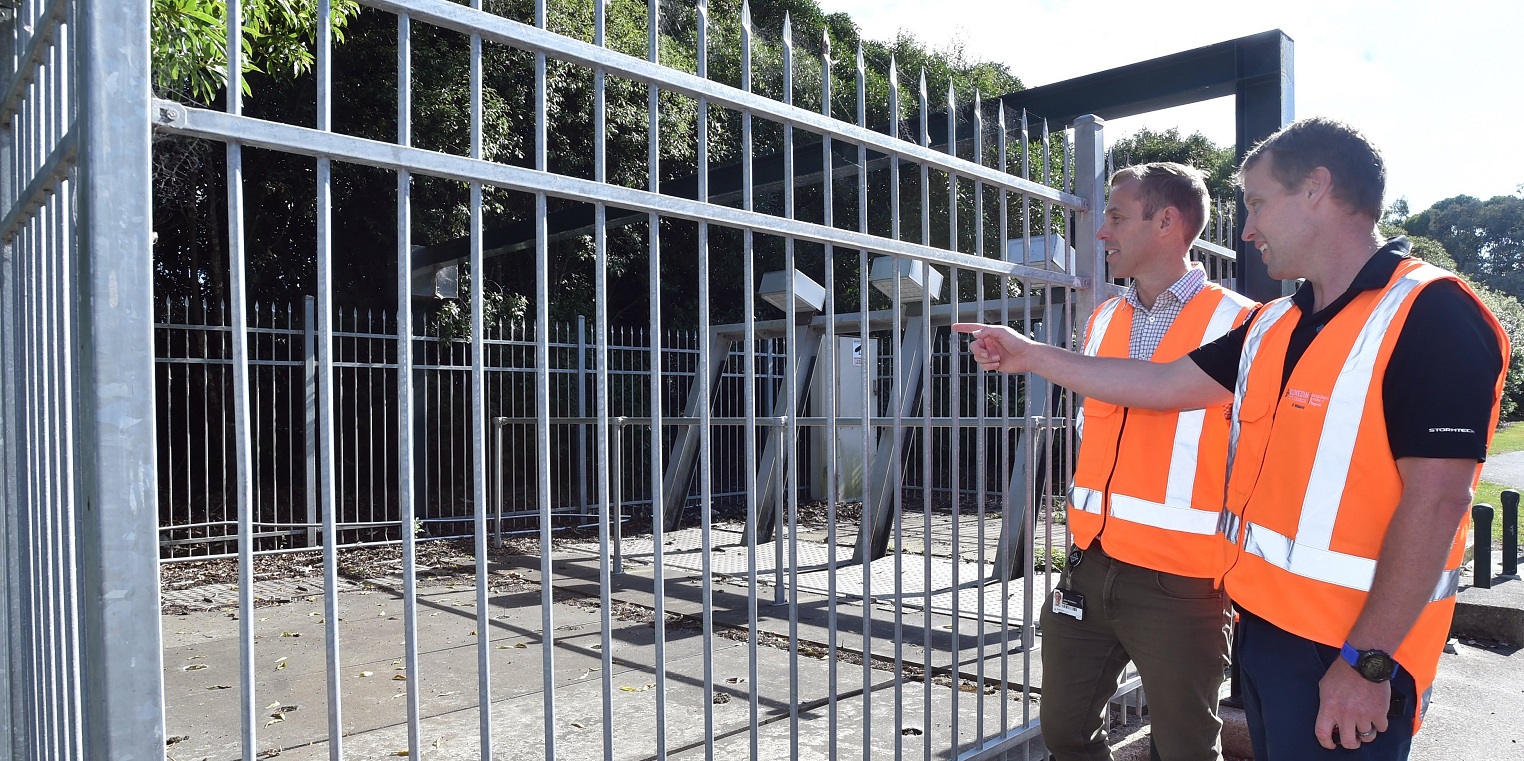 John McAndrew (left) and Grant Wilson, both from the Dunedin City Council, look at the grates at...