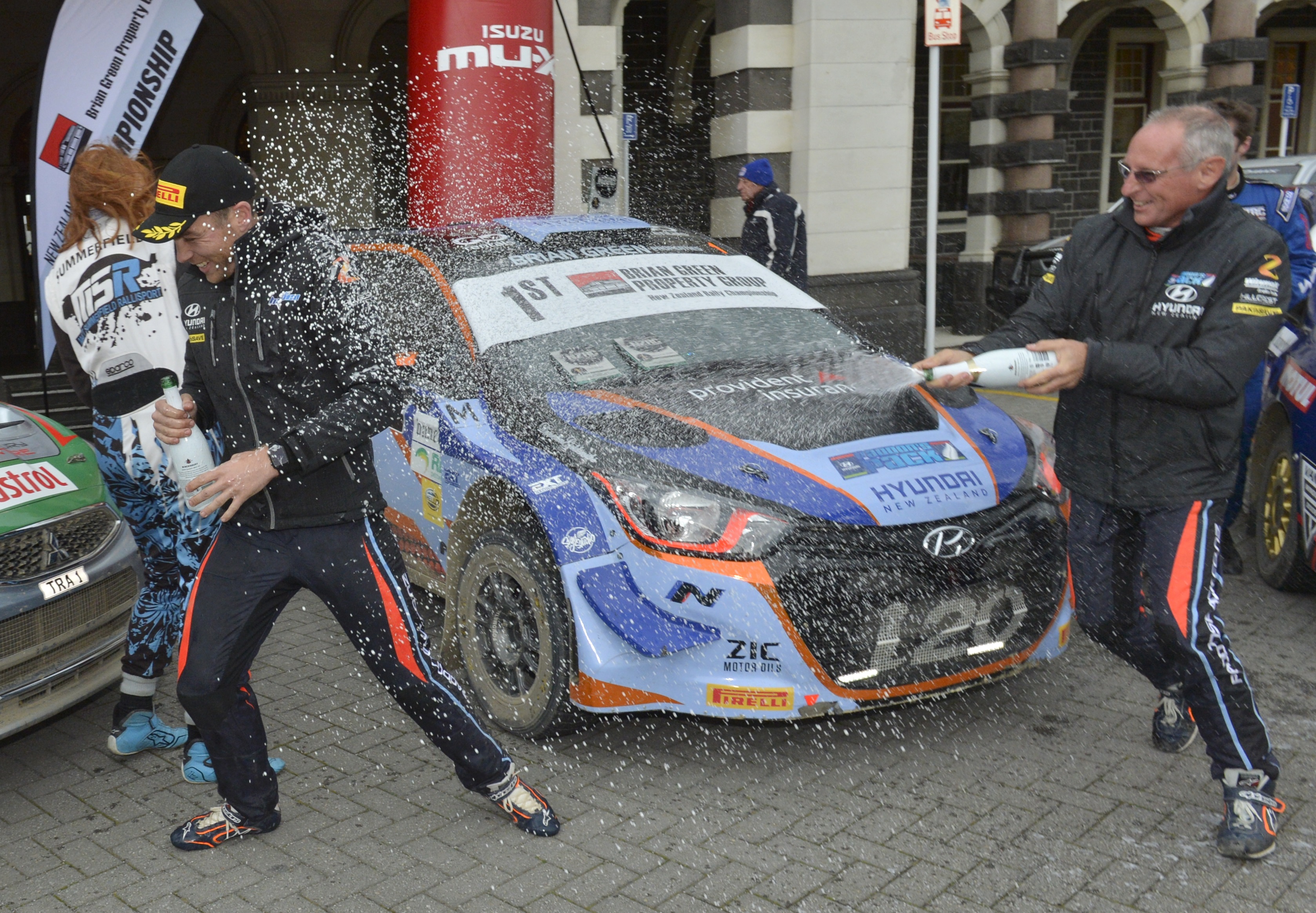 Otago Rally winner Hayden Paddon (left) is ambushed by his co-driver, John Kennard, during the...