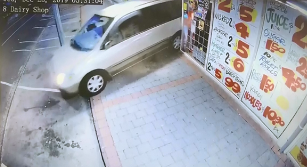 CCTV footage shows a people-mover vehicle being reversed into the store on Hukanui Rd. Image via...