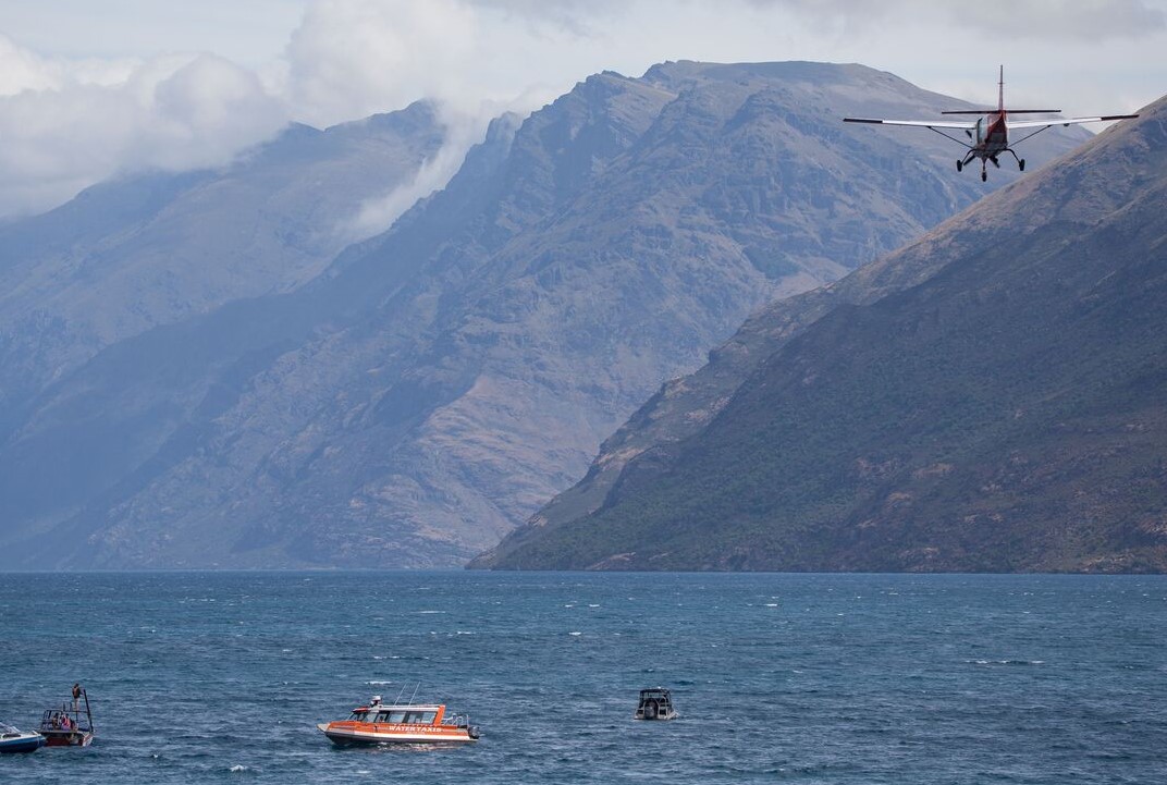 Searchers scour Lake Wakatipu for the missing skydiver. Photo: James Allan Photography