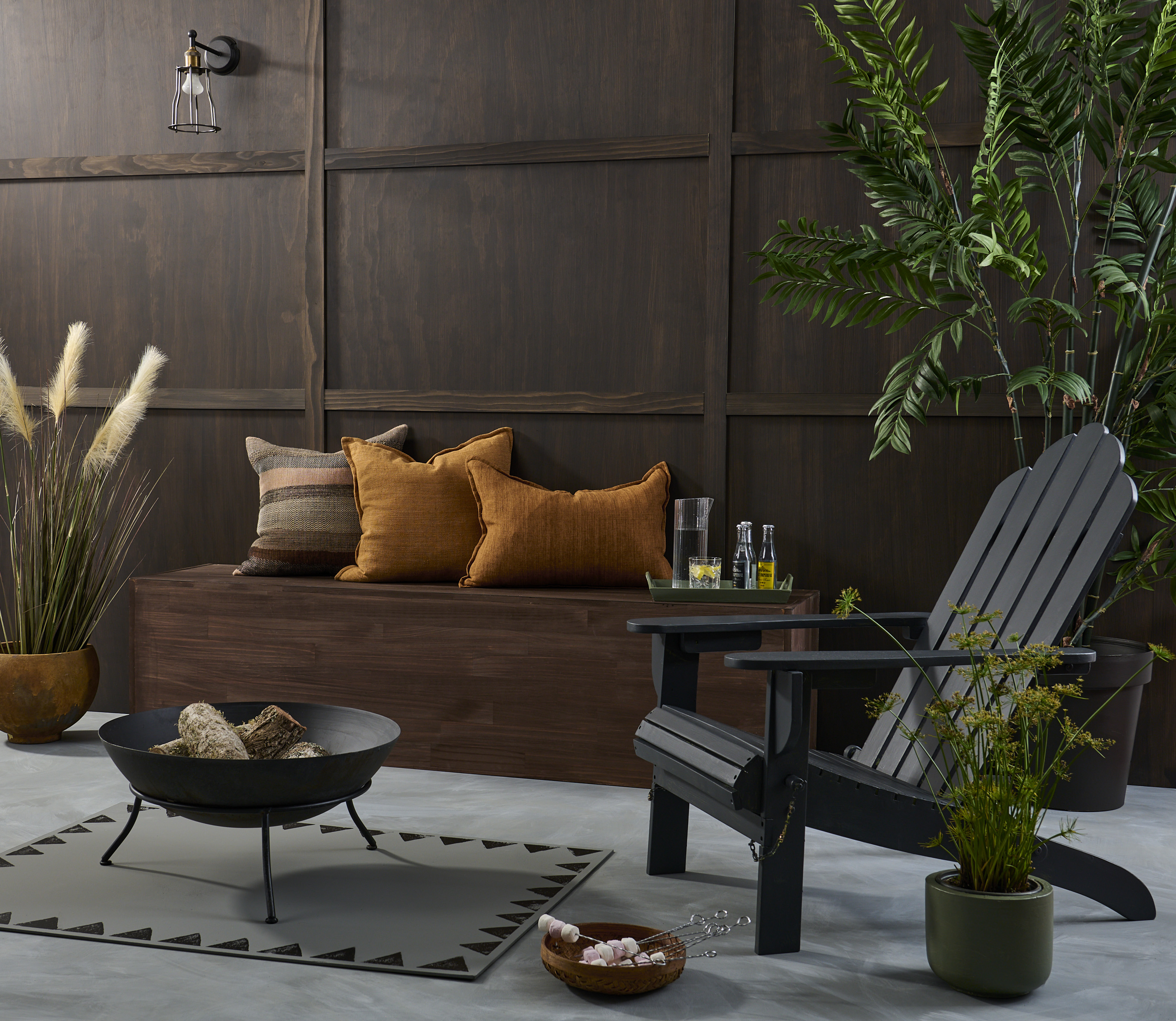 Choosing a darker stain brings cosiness and drama to this outdoor area, while still showcasing...