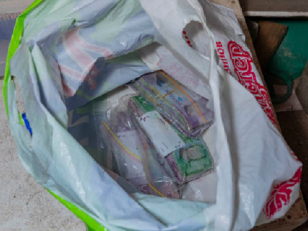 A total of $20,555 cash was found during the execution of the search warrant. Photo: NZ Police