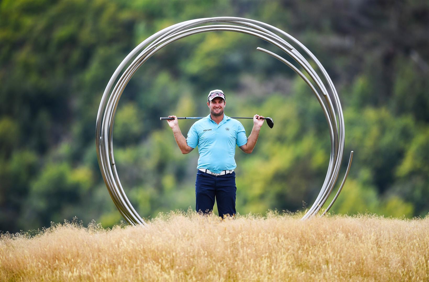 New Zealand No 1 Ryan Fox poses in front of a sculpture on The Hills course in Arrowtown during a...