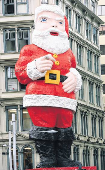 The giant Santa on the Farmers building in central Auckland. Photo: NZ Herald