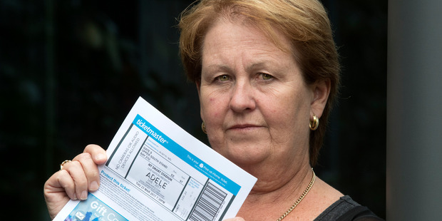 Deborah Light with the Adele ticket she never bargained for. Photo: NZ Herald 