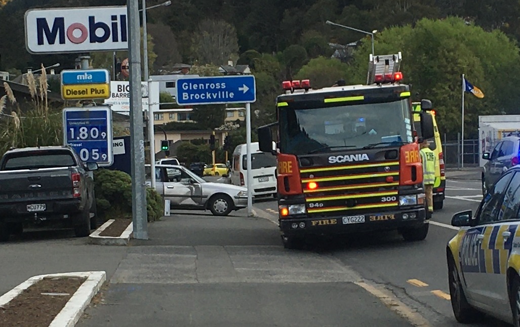 Emergency services attend the collision in Kaikorai Valley this afternoon. Photo: Emma Perry
