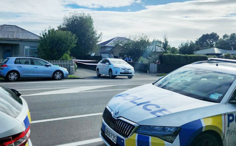 Police at the scene on Ferry Rd. Photo: RNZ/Anna Sargent