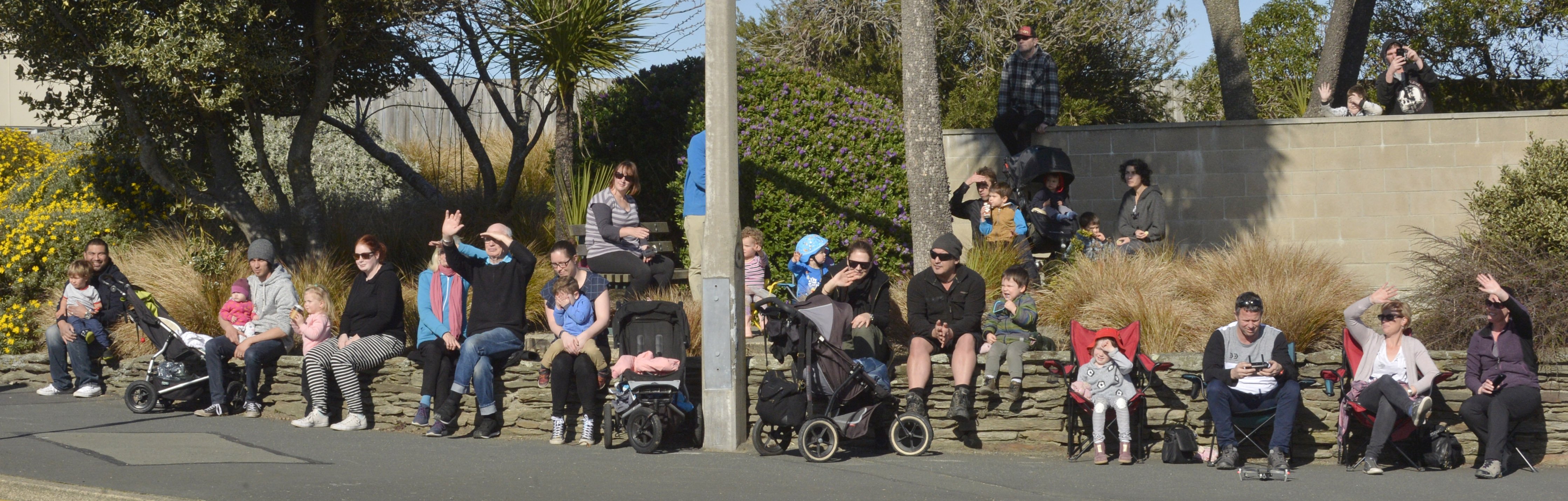 Large groups of people line the streets of Dunedin to watch more than 200 trucks drive past each...