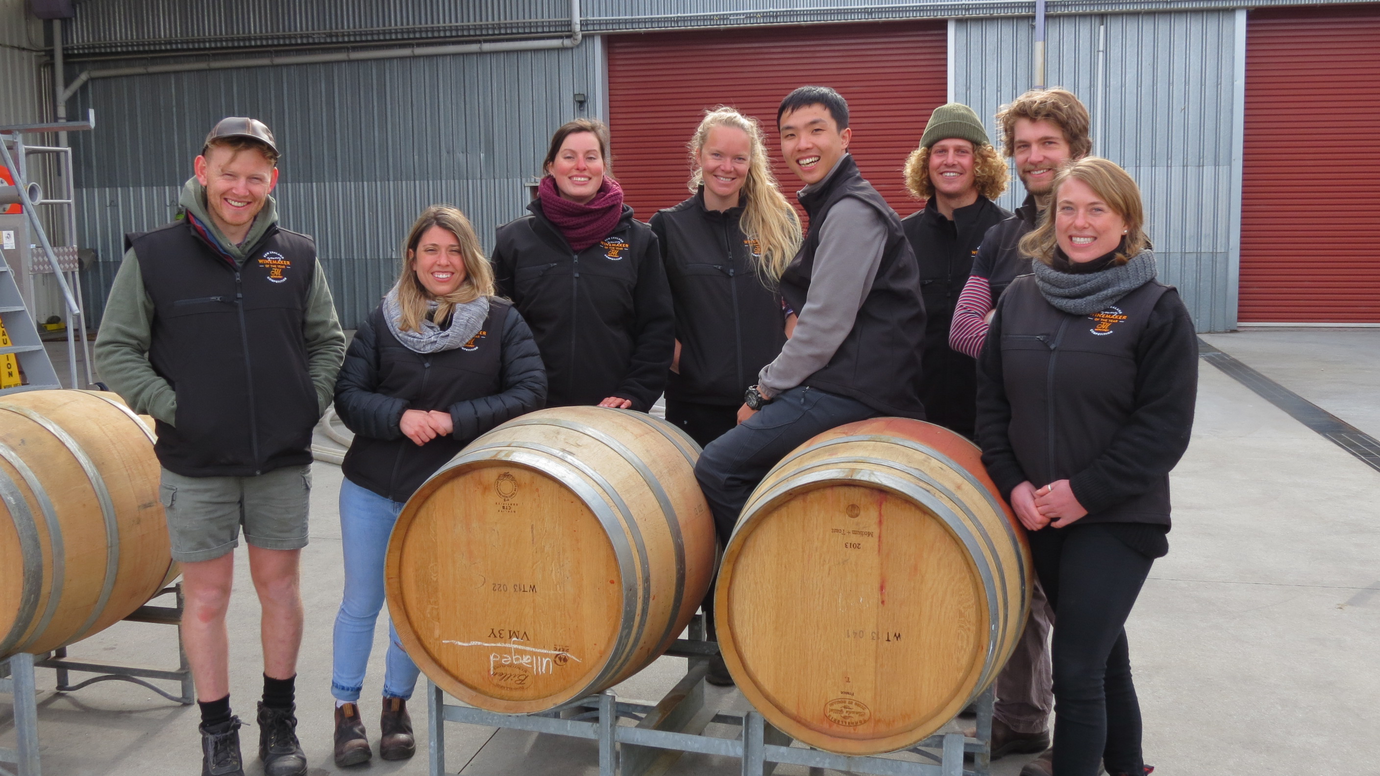 Eight young winemakers wait to compete in the Vin Olympics, which are part of the Tonnellerie de...