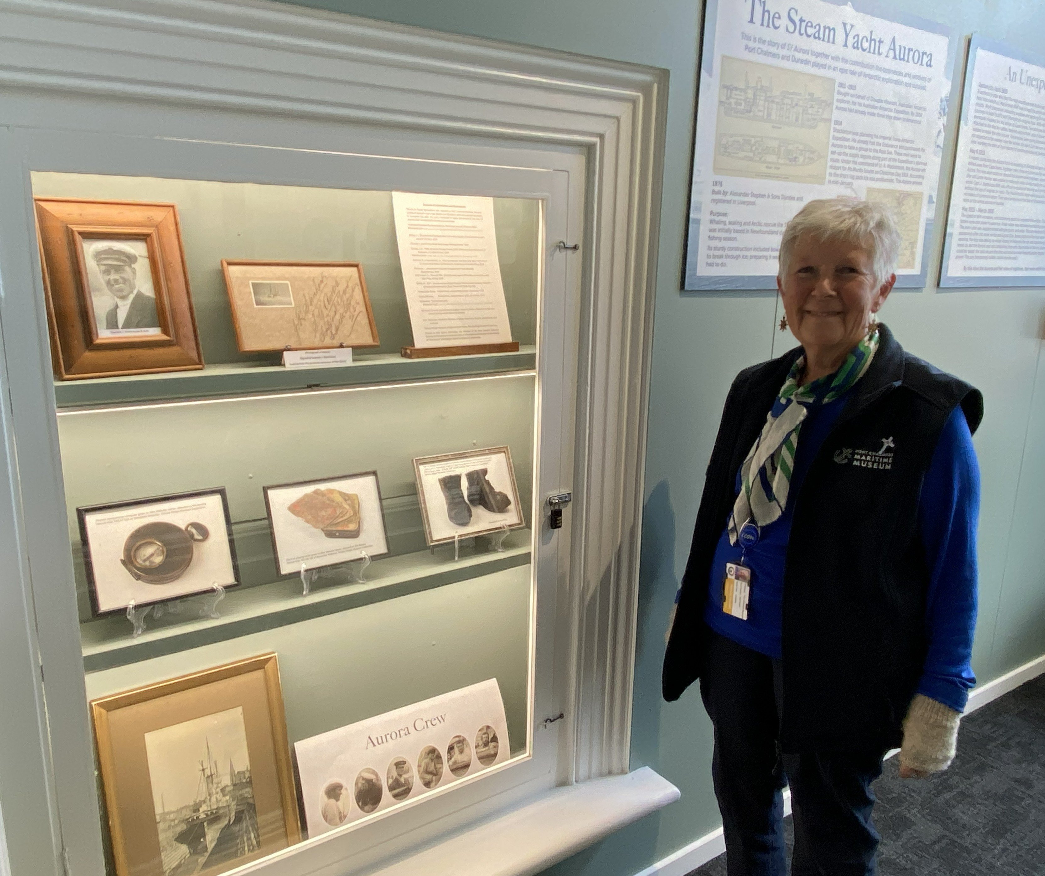 Port Chalmers Maritime Museum volunteer Pat Caswell is pictured with images and artefacts...
