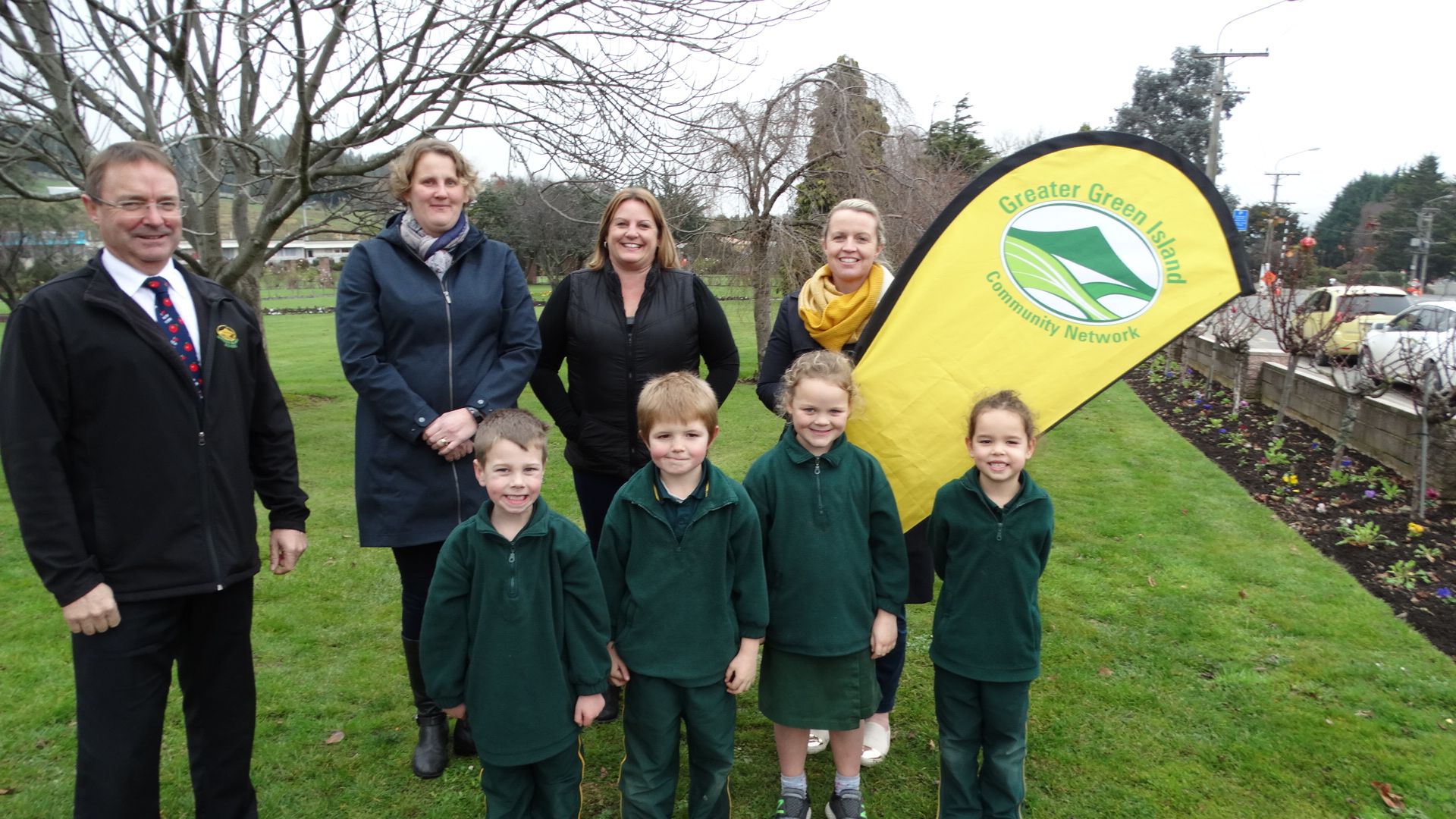 Greater Green Island Community Network members (back row, from left) chairman Steve Hayward, ...