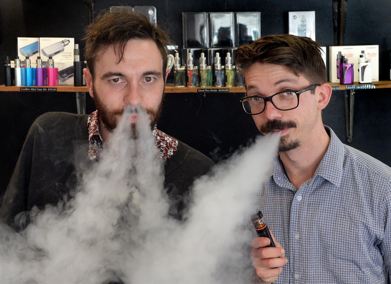 Dunedin e-cigarette store Vapourium account manager Cody Peneamene (left) and operations manager...