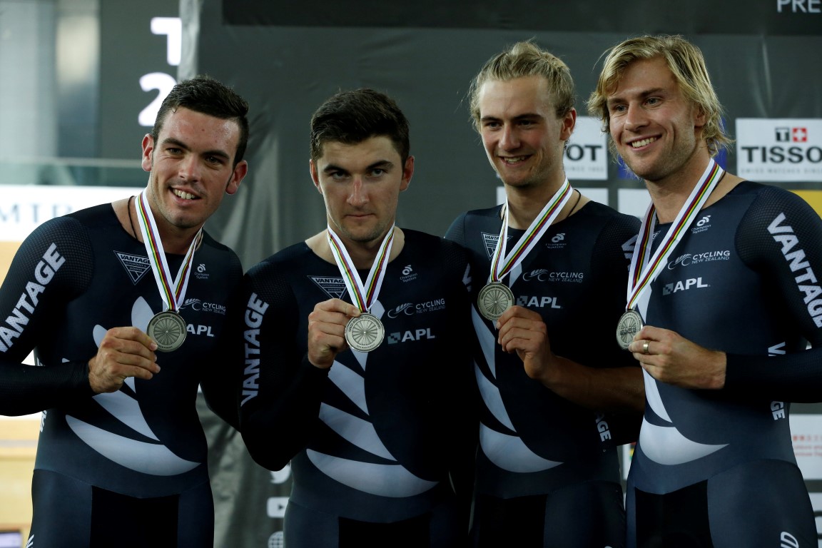 The New Zealand team celebrate with their silver medals. Photo Reuters