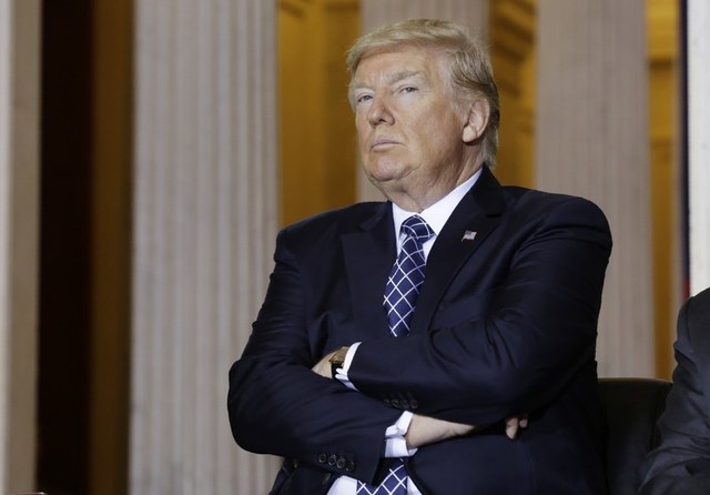 Donald Trump at holocaust memorial in Berlin. Photo: Reuters