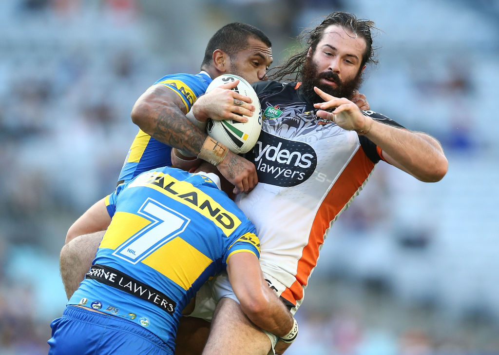 Tigers skipper Aaron Woods received a groin injury during the game. Photo: Getty