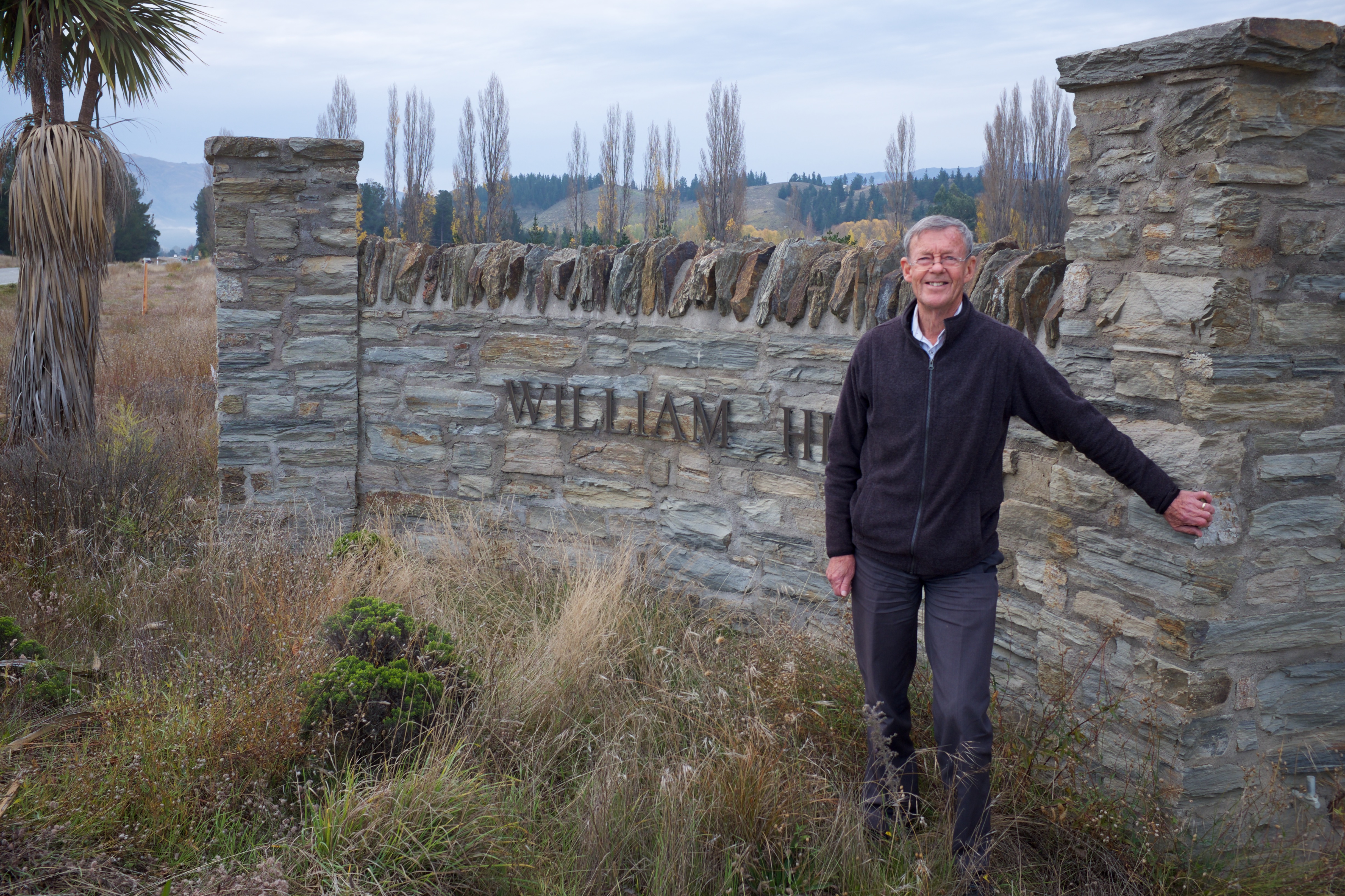 Alexandra property developer Russell Ibbotson at the gate of his planned subdivision. Photo:...