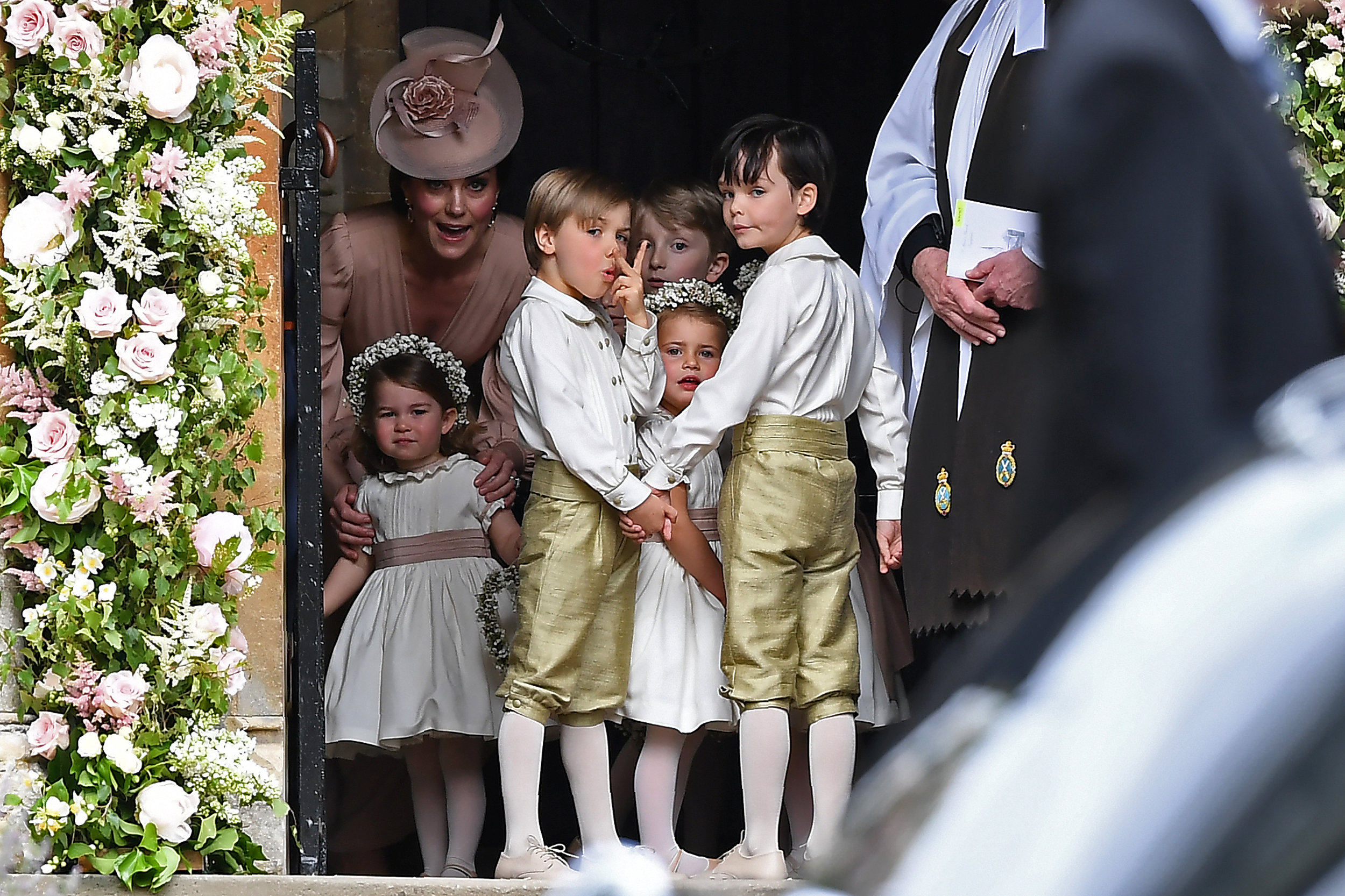 Britain's Catherine, Duchess of Cambridge stood with her daughter Princess Charlotte, as they...