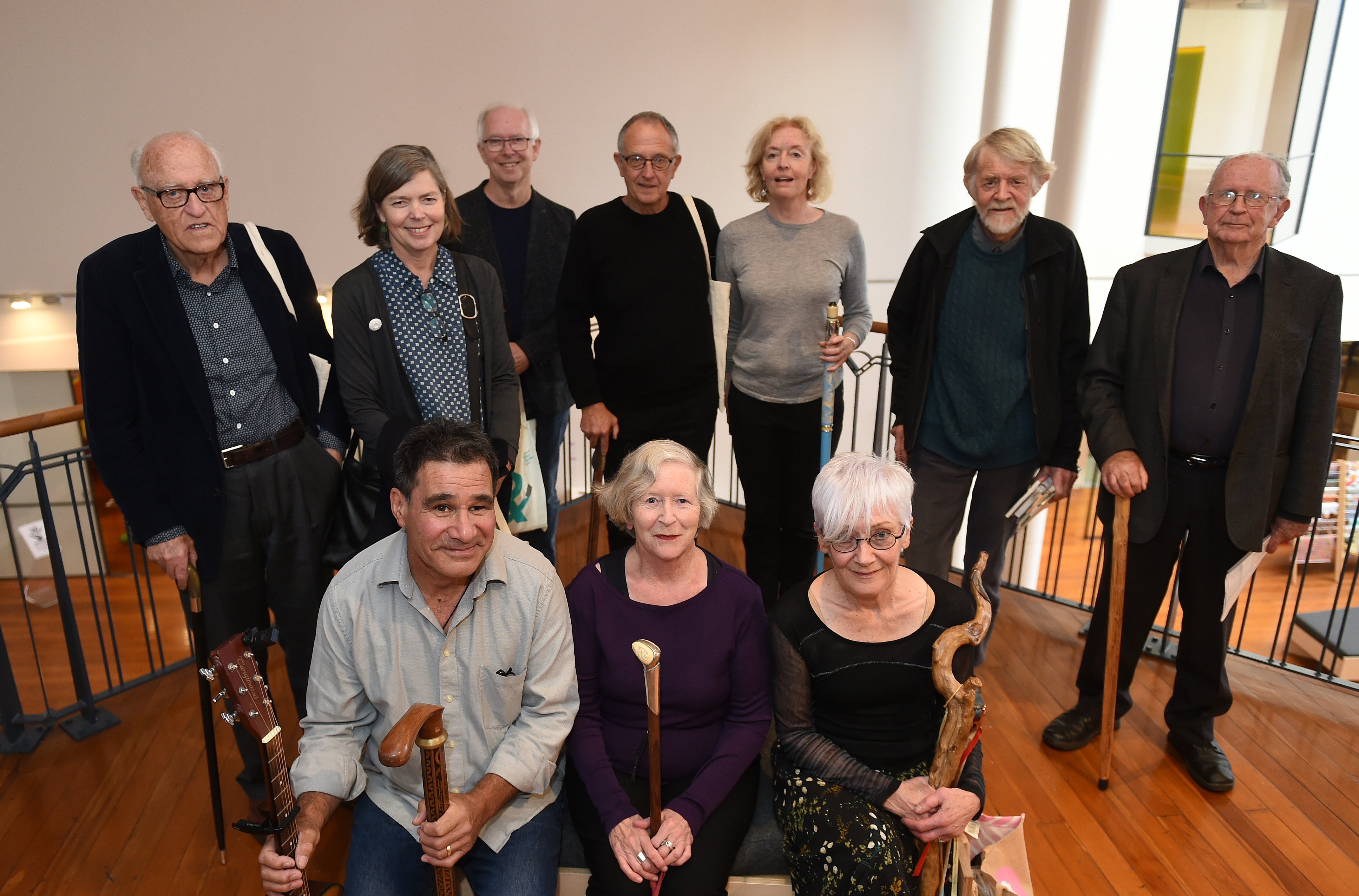 (back from left) CK Stead, Jenny Bornholdt, Bill Manhire, Ian Wedde, Michele Leggott, Brian Turner, Vincent O'Sullivan, (front from left) Rob Tuwhare (representing his late father Hone Tuwhare), Elizabeth Smither and Cilla McQueen. Photo: Gregor Richardso