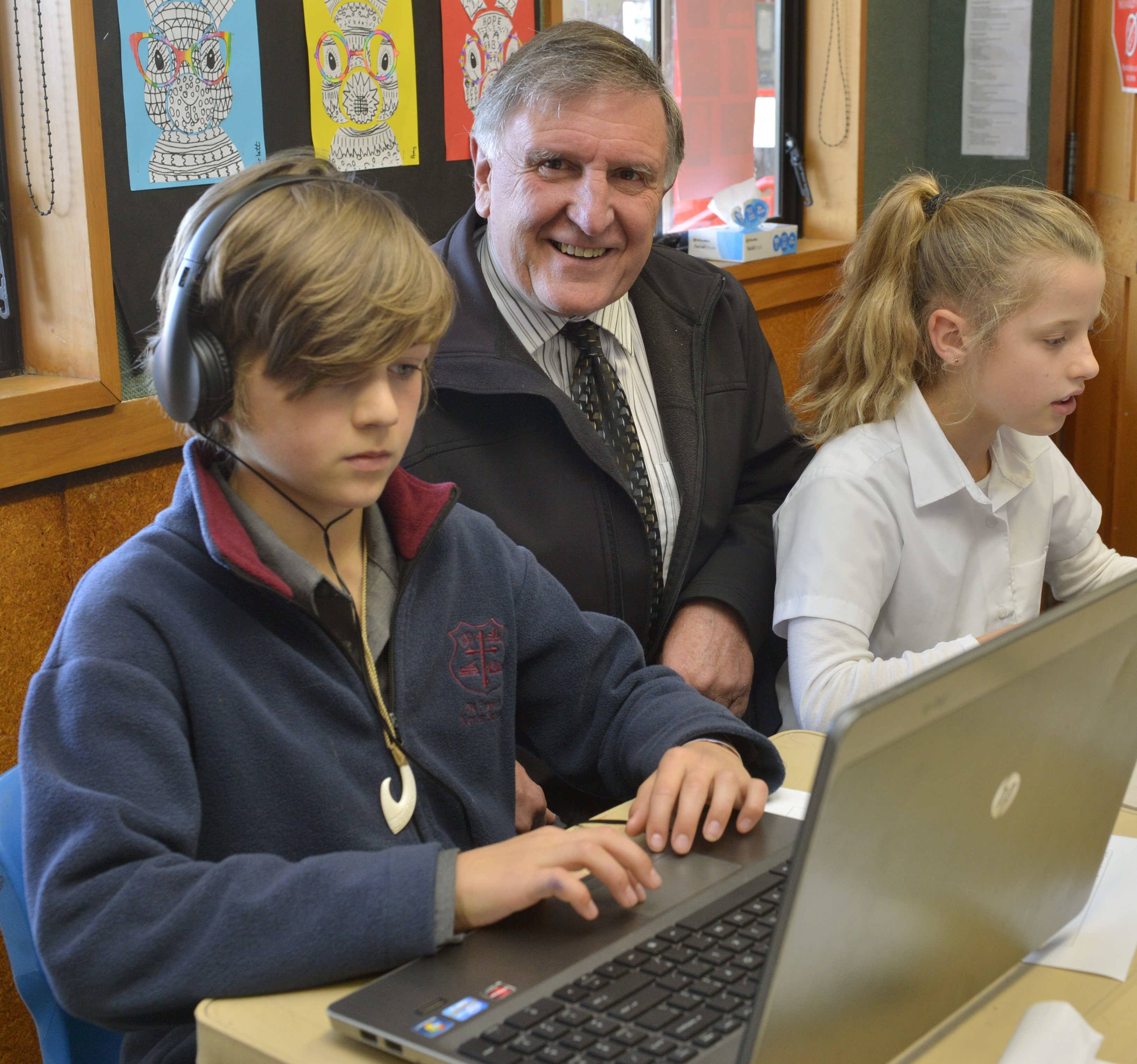 St Francis Xavier School principal Craig Ward with pupils Oscar Ross (10) and Amy Hitchcox (9)....